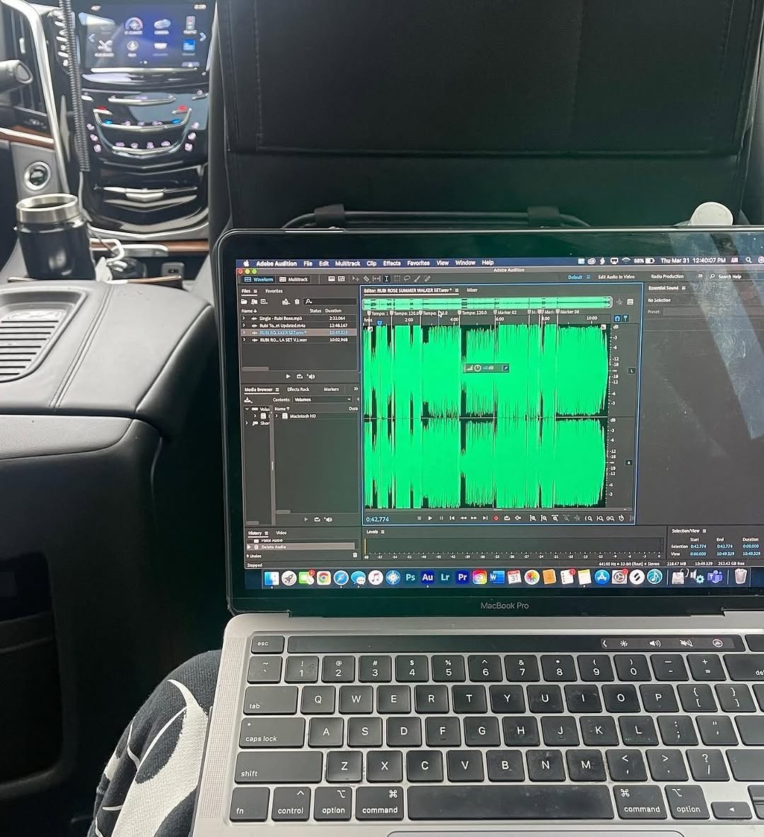 Audio production workspace with a laptop