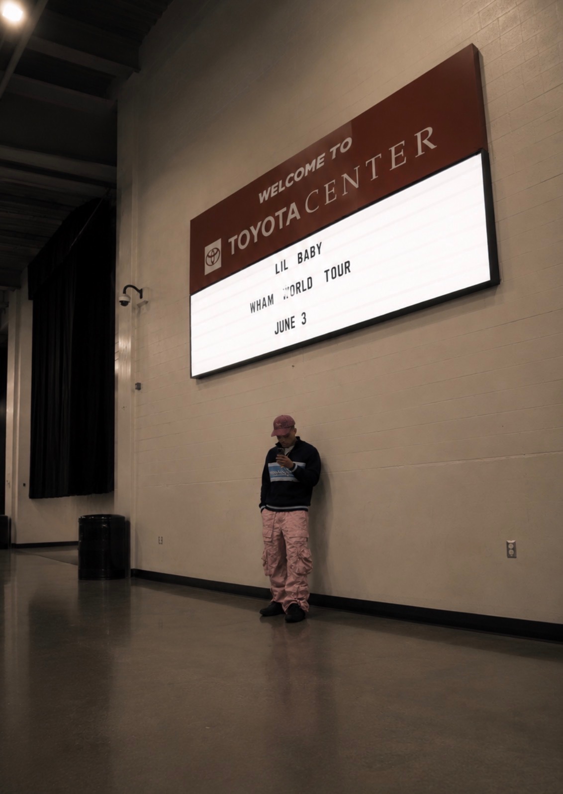 CJ WestCoast under the Welcome to Toyota Center sign